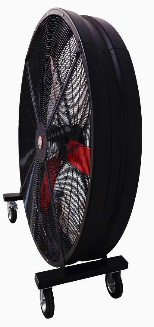 Side view of a 72" Floor Fan with black housing, red blades, metal frame, red and white brand badge, black and silver casters and metal bearings, product of Industrial Fan Co, on a white background