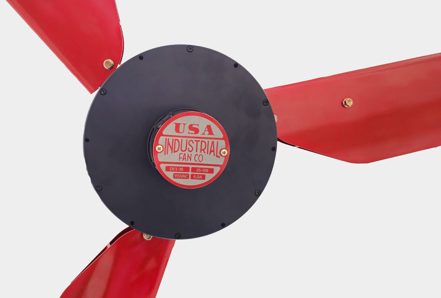 Close up of a motor casing, red and silver brand badge and 3 red blades for DF3 Red Industrial Ceiling Fan, product of Industrial Fan Co, on a white background