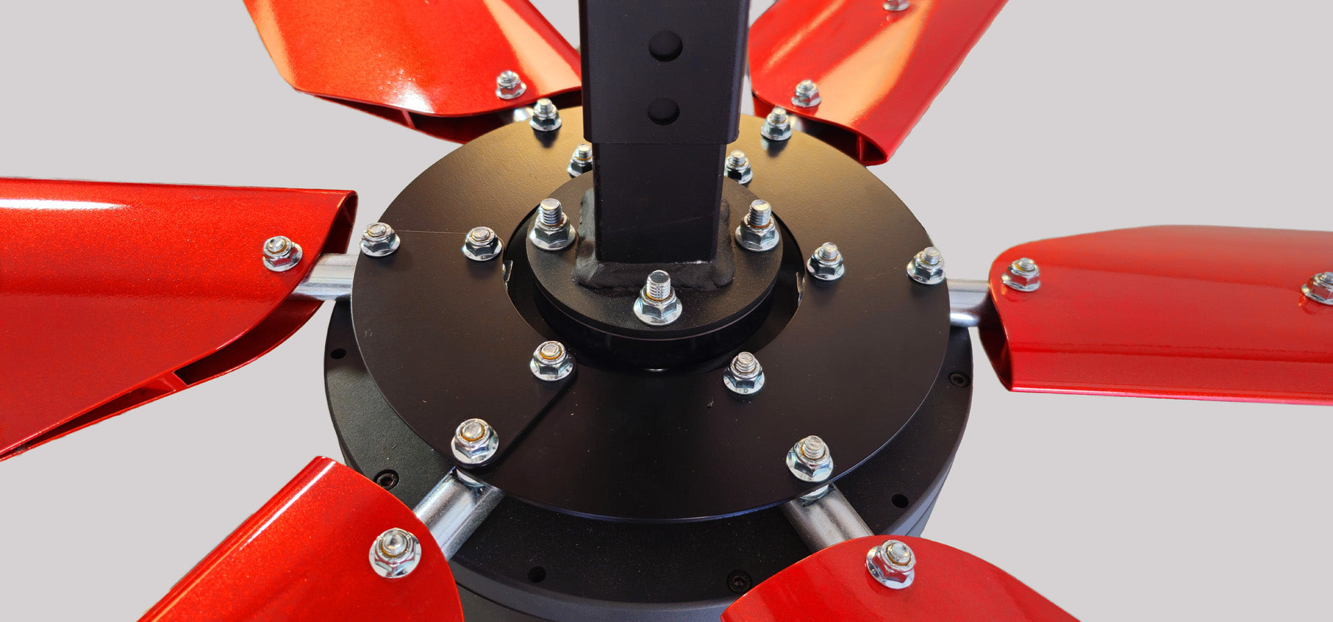 Close up of a telescoping mount, motor,  and 6 blades with exposed silver hardware, for DF6 Red Industrial Ceiling Fan, product of Industrial Fan Co