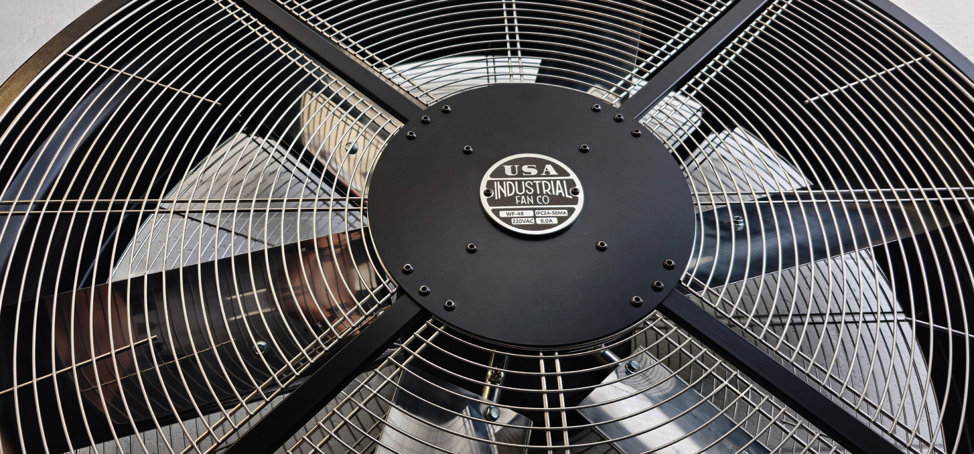 Close-up of a 48" industrial floor fan with a visible IFC brand logo