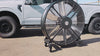 Close-up of a 48" Floor Fan with black housing, silver blades, metal frame, black casters and metal bearings, product of Industrial Fan Co